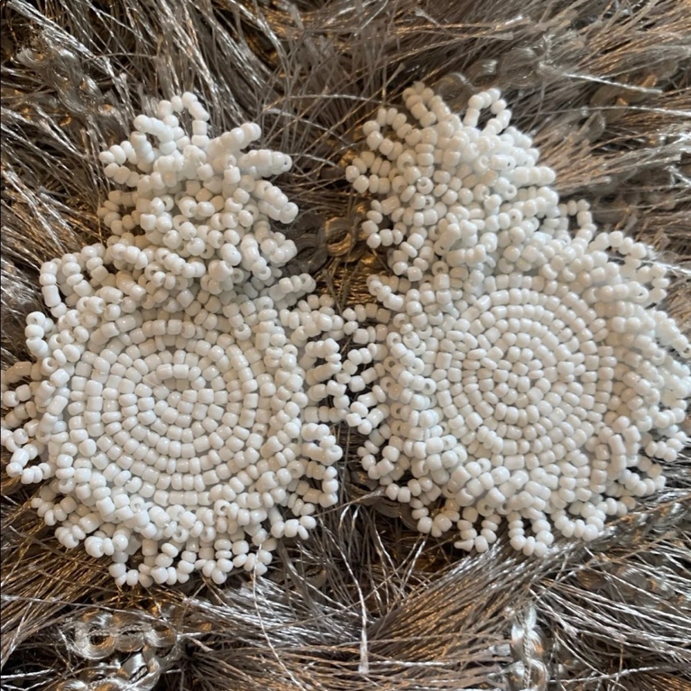Big white earrings